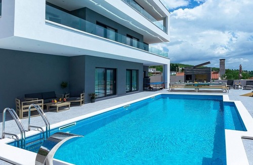 Jesenice Villa | Modern Villa for Large Groups, Private Heated Pool, Sauna, Jacuzzi, Gym, Games Room & Sea Views!