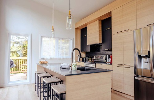Riviere-Rouge Ski Chalet | Modern Waterfront Cottage on the Rouge River & Spa