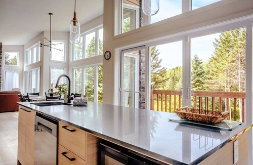 Riviere-Rouge Ski Chalet | Modern Waterfront Cottage on the Rouge River & Spa