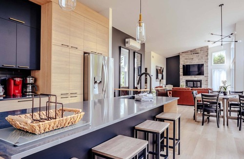 Riviere-Rouge Ski Chalet | Modern Waterfront Cottage on the Rouge River & Spa