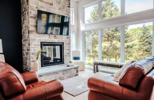 Riviere-Rouge Ski Chalet | Modern Waterfront Cottage on the Rouge River & Spa