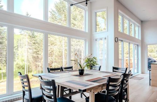 Riviere-Rouge Ski Chalet | Modern Waterfront Cottage on the Rouge River & Spa