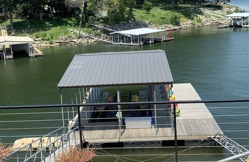 Afton House | Modern waterfront home on Monkey Island with dock