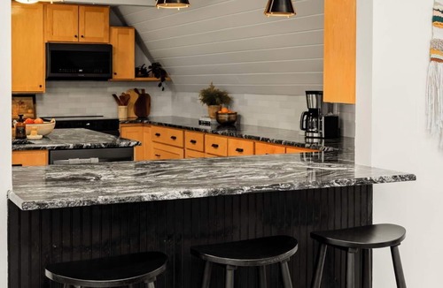 Conestoga House | Modern Wooded A-Frame Firepit, Playroom & Game Room Family-Friendly