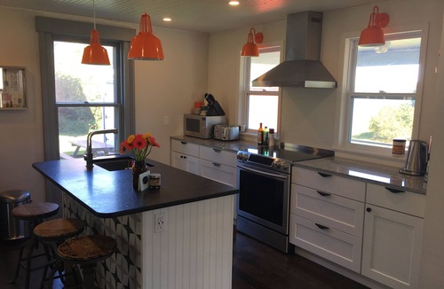 Lunenburg County House | Modernized waterfront heritage homestead with entertainment barn