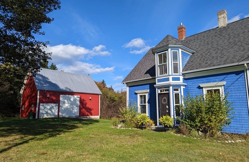 Lunenburg County House | Modernized waterfront heritage homestead with entertainment barn