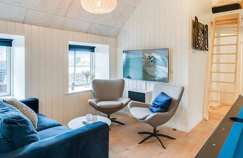 Klegod Strand House | Modernly equipped holiday home with activity room, pool, whirlpool and sauna