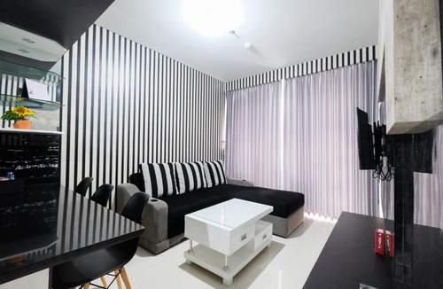 Bintaro Apartment | Monochrome 1BR Lexington Apartment By Travelio