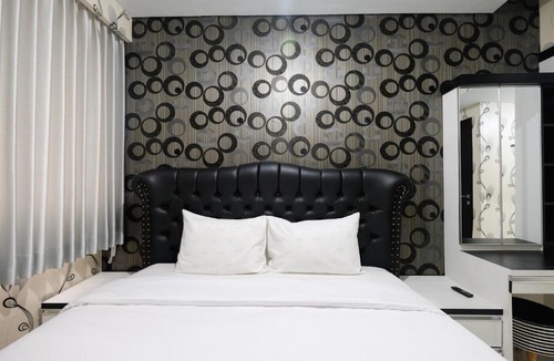 Bintaro Apartment | Monochrome 1BR Lexington Apartment By Travelio