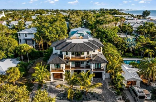 Anna Maria House | Moondance - Steps to the beach! Heated pool!