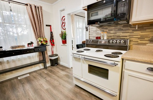 Garden City Apartment | Moose Haven | Pet Friendly, Hot Tub, Walk 2 Lake, Huge Yard, AC