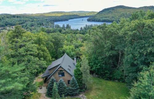 Bryant Pond Ski Chalet | Mountain getaway overlooking Lake Christopher