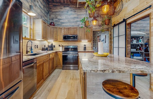 Webster House | Mountain view home with a large patio and private hot tub | fire-pit | gas grill