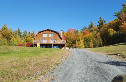 Sutton Cabin | Mountainside Spacious and Private Log Home.