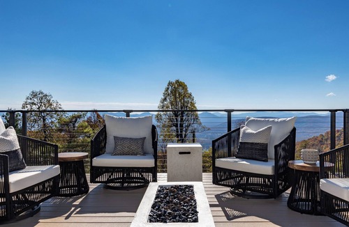 Afton House | Mountaintop Blue Ridge retreat | Hot tub, panoramic views, private putting green & hidden speakeasy