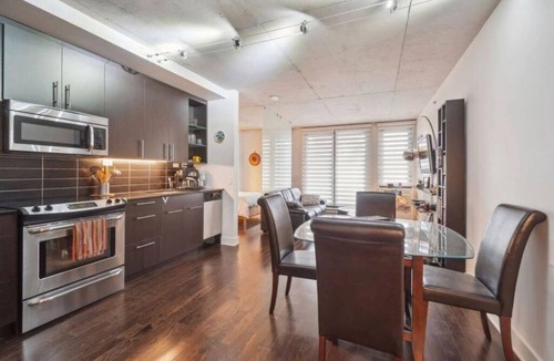 Griffintown Condo | Move-In Ready: Fully Furnished Modern Condo with Balcony & Courtyard Views