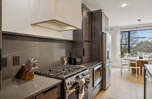 Hurwood Heights Apartment | Multi-level home with hot tub and rooftop views