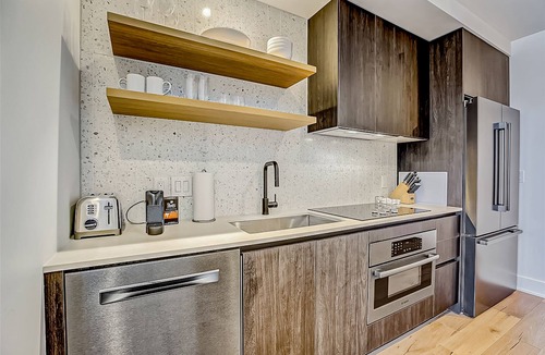 Rainey Street Historic District Apartment | Natiivo Austin studio - lake & skyline-view balcony, pool & gym - dogs OK