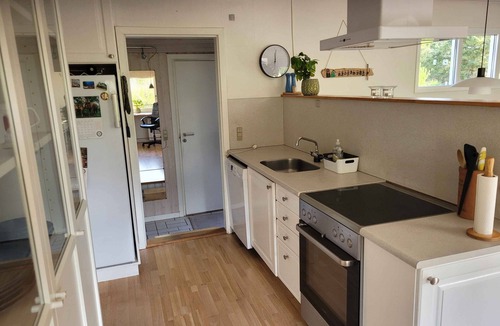 Klitmoller Cottage | Natural plot fireplace and true west coast