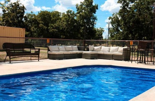 Sutherland Springs House | Nature by Day, Comfort by Night: Texas' Best Glamping in this Cibolo Safari Tent Rental
