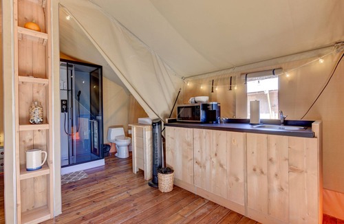 Johnson City RV Rental | Nature Glamping Stay with Fire Pit