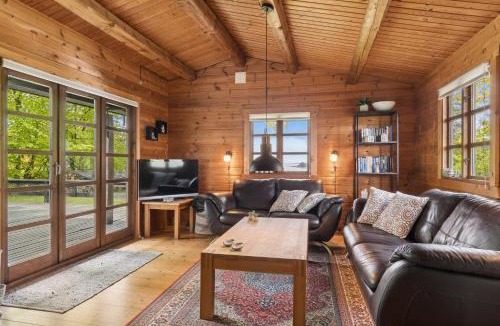 Ronbjerg House | Nature Holiday In Peaceful Log Cabin By Water