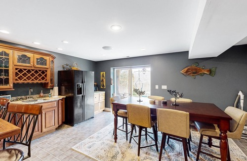Livingston House | Nature lover's lakefront home with a beach, dock, fire ring, & more