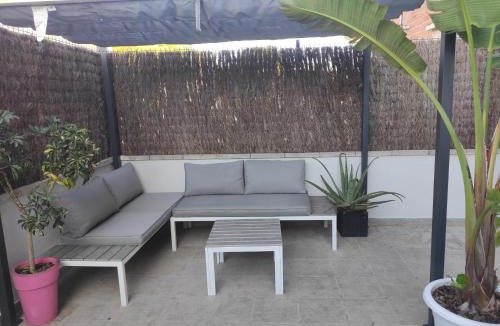 Comarruga Apartment | Near beaches large private patio, aircon & community pool