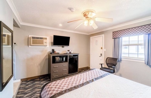 Ira Hotel | Near Sammy Baugh Golf Course & Local Dining Spots | Queen Bed Non‑Smoking