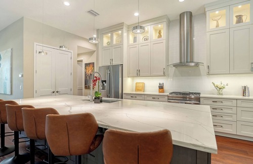 South Poinsettia House | Near Siesta Key | Palm-Lined Pool & Spa Retreat in Sarasota