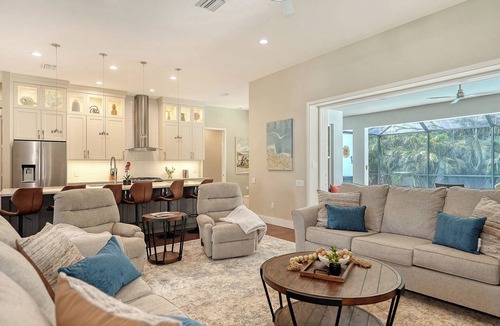 South Poinsettia House | Near Siesta Key | Palm-Lined Pool & Spa Retreat in Sarasota