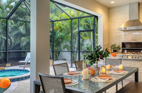 South Poinsettia House | Near Siesta Key | Palm-Lined Pool & Spa Retreat in Sarasota