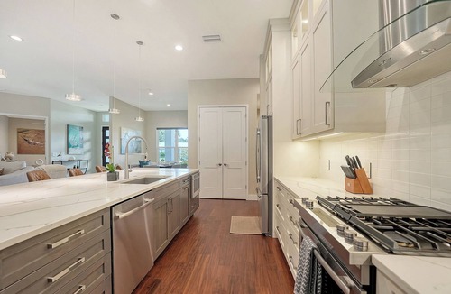 South Poinsettia House | Near Siesta Key | Palm-Lined Pool & Spa Retreat in Sarasota