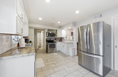 Wichita House | Near WSU: Bumper Pool and Fire Pit!