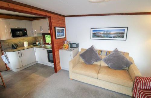 Skelwith Bridge House | Neaum Crag Lodge ideal for a couple or family with young children in a woodland setting at Skelwith Bridge