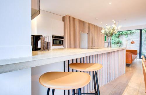 Hillside House | Neoteric Home Wimbledon Village