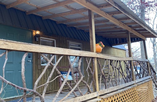 Gray Hawk Cabin | Nestled in woods a stone's throw from Daniel Boone Forest and 600 mi of trails .