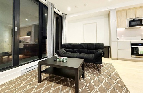 Longueuil Condo | NEW 1bdrm condo, 2mins subway + high walk score!