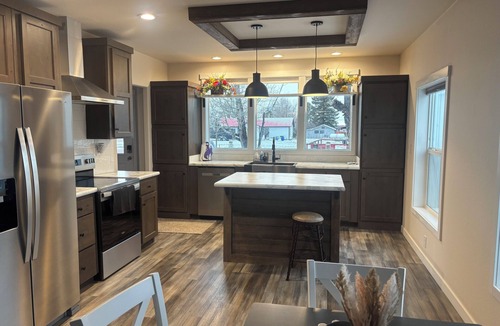 Carbon County House | New and comfortable home with open floor plan and electric fireplace.