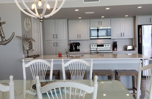 West Panama City Beach Condo | 😎NEW Beachfront 60'GLASS BEACH VIEWS in 2 MASTER Suites+FREE Beach Chairs😎402E