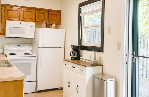 Lawrence House | NEW Charming 2 bedroom, with cozy, quiet backyard, close to campus and LMH,