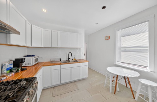 Greater Grand Crossing House | NEW! Chicago Getaway with Pool Table & Modern Comfort