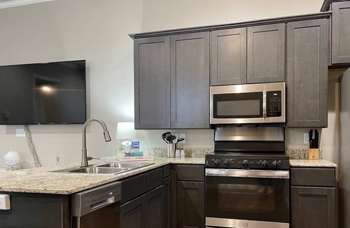 Downtown Condo | New Condo - Sleeps 6 - Downtown Lafayette! #101