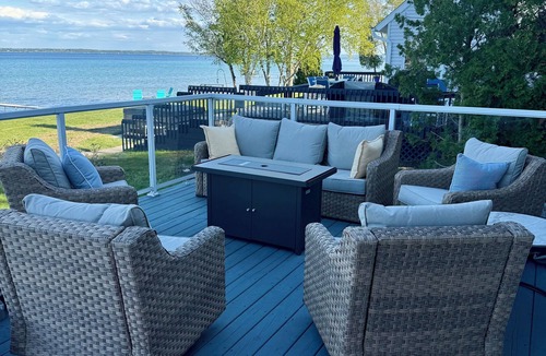 Suttons Bay House | NEW! Direct waterfront Grand Traverse Bay-Suttons Bay. Kayaks, Sandy