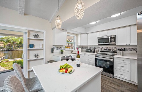 Tampa Shores House | NEW Heated Salt Pool & Spa on Waterfront Canal