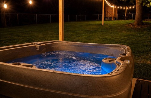 Fayetteville House | New! Hot Tub, Sauna, Arcade, cozy cottage - walk to everything! Great location!