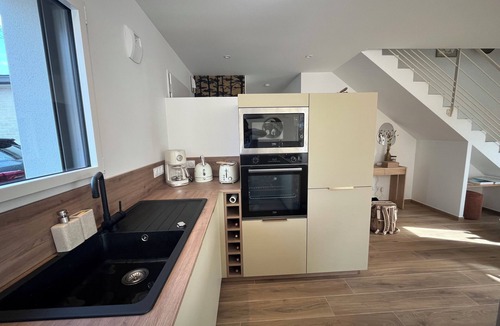 Kervoyal House | New house with swimming pool 200m from the sea.