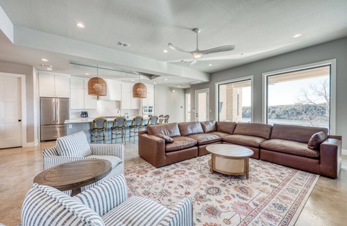 Burnet House | NEW Lakefront Luxury with game room, heated pool, fire pit, & fitness equipment
