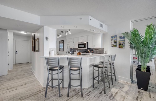 Seawinds Condo Condo | NEW listing! Direct Oceanfront 2/2 | Fully Updated | Heated Pool & Garage Parking