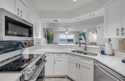 Seawinds Condo Condo | NEW listing! Direct Oceanfront 2/2 | Fully Updated | Heated Pool & Garage Parking